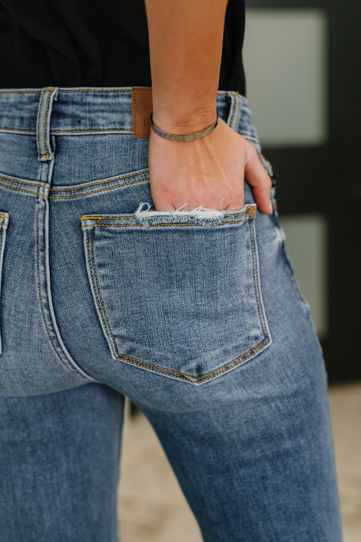 Close-up of blue jeans with a blurred background