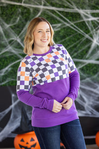 Natalie Pullover in Checkered Bats and Purple