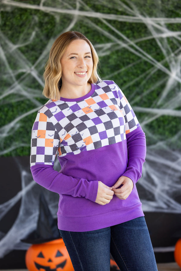 Natalie Pullover in Checkered Bats and Purple