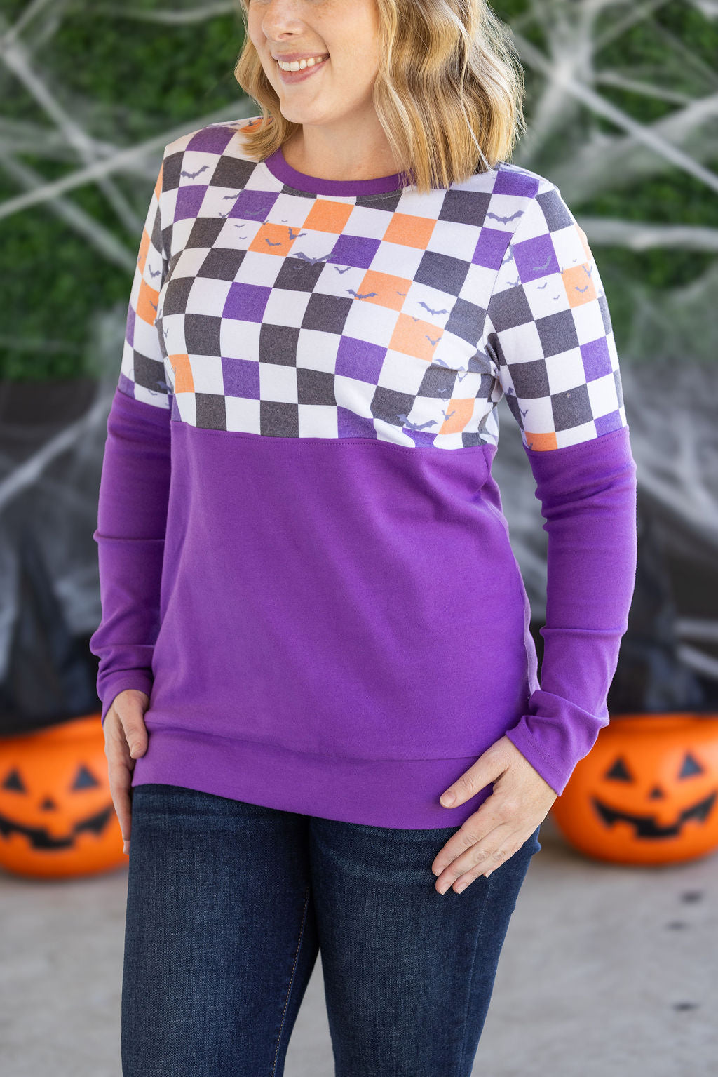 Natalie Pullover in Checkered Bats and Purple