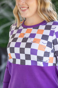 Natalie Pullover in Checkered Bats and Purple