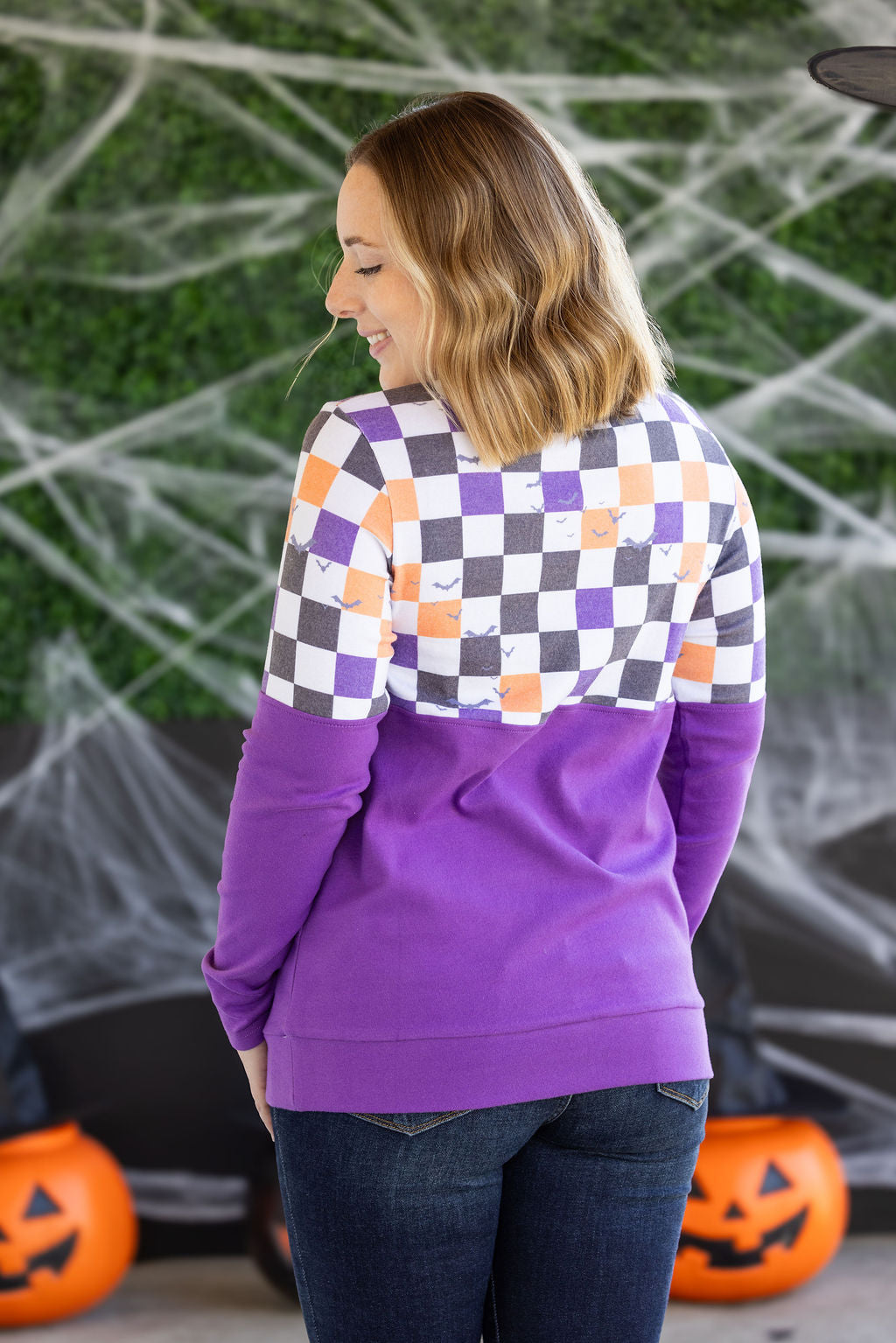 Natalie Pullover in Checkered Bats and Purple