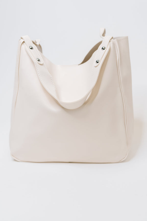 Beige tote bag on a white background