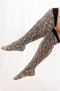 Marled gray knee-high socks on a white background