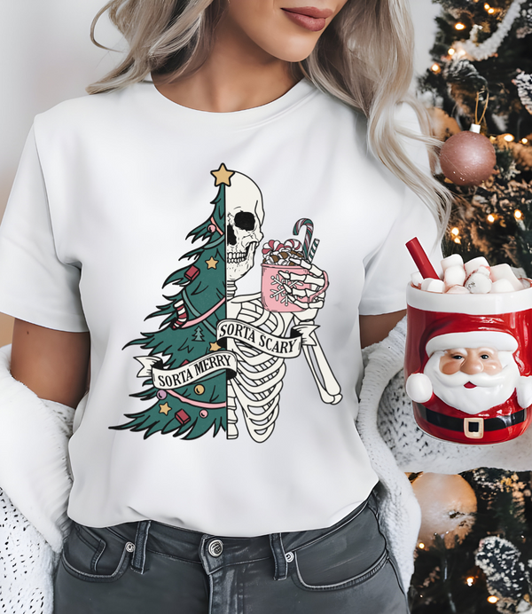 Person wearing a white t-shirt with a Christmas-themed skeleton design, surrounded by holiday decorations.