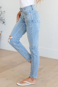 Mid Rise Control Top Distressed Skinny Jeans